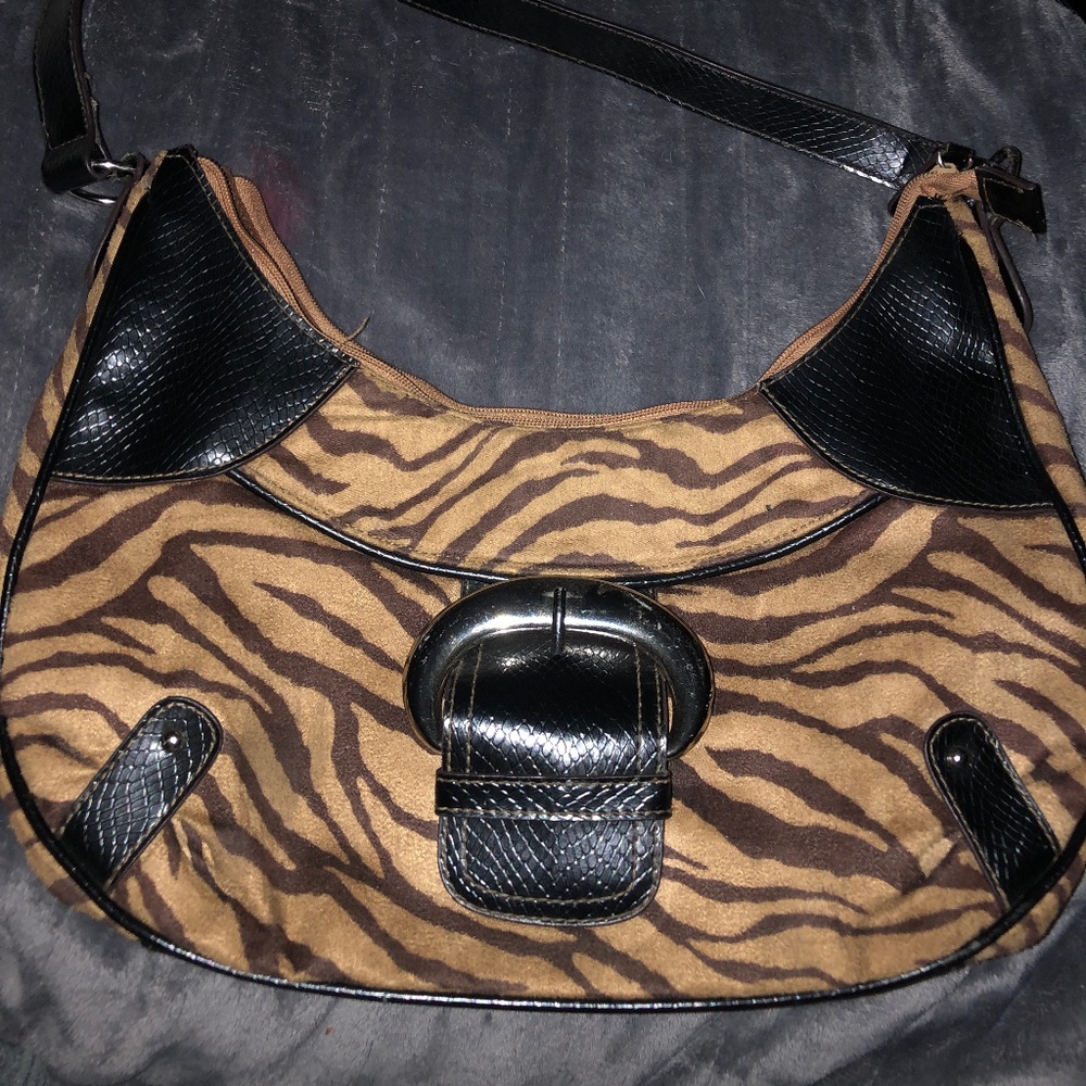 Jaclin Smith purse